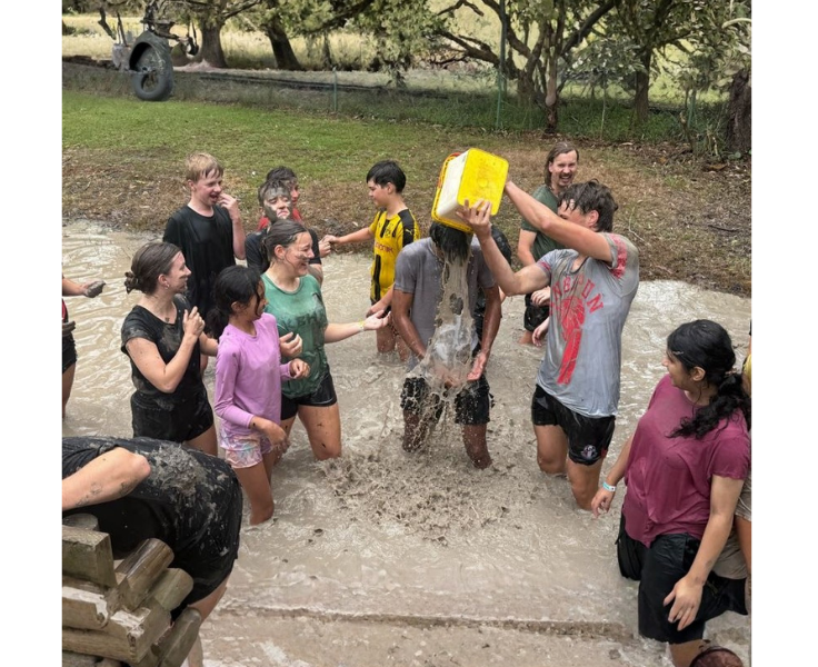Year 7 students participating in the mud run at Great Aussie Bush camp